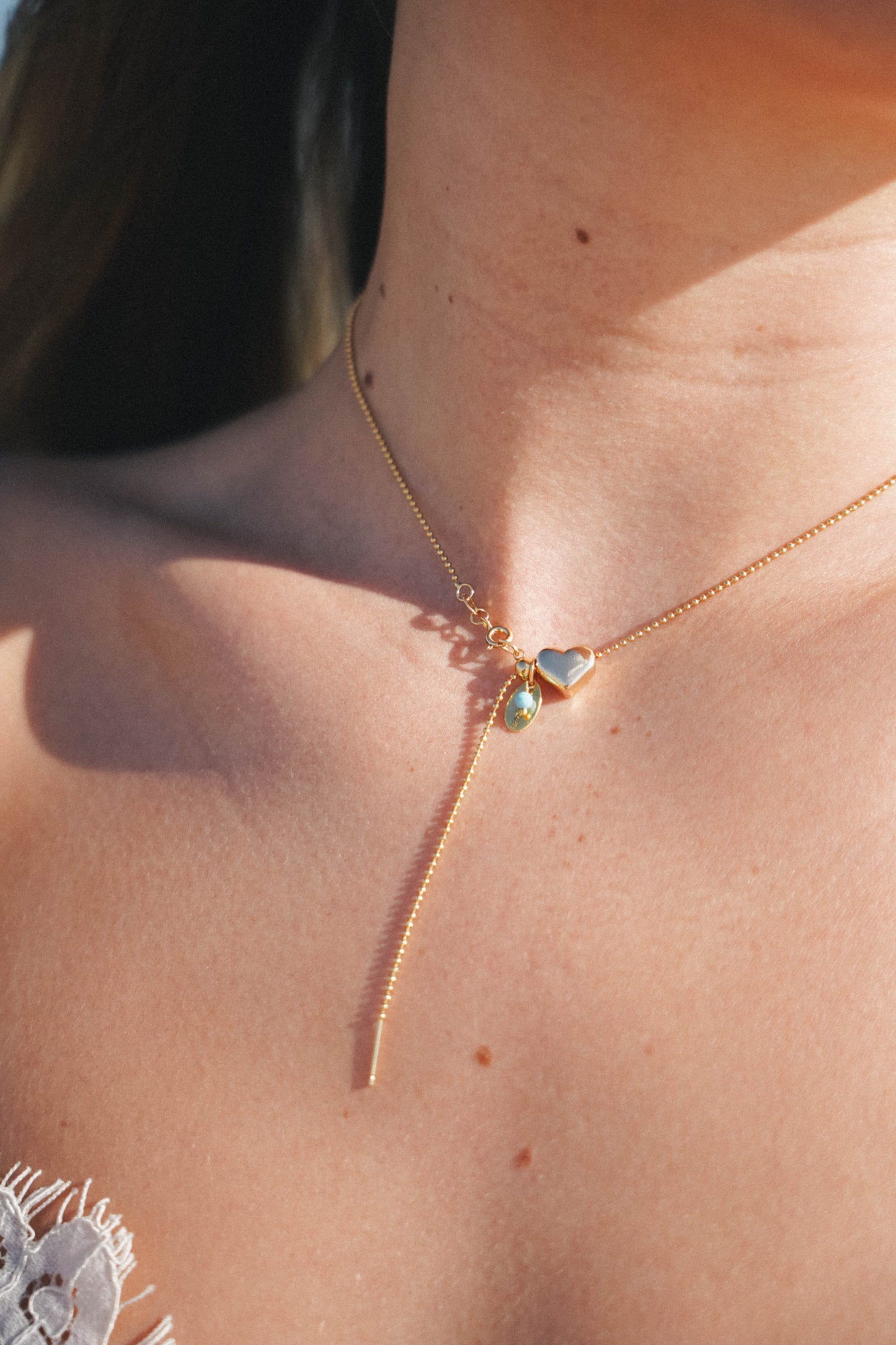 Adjustable gold heart necklace