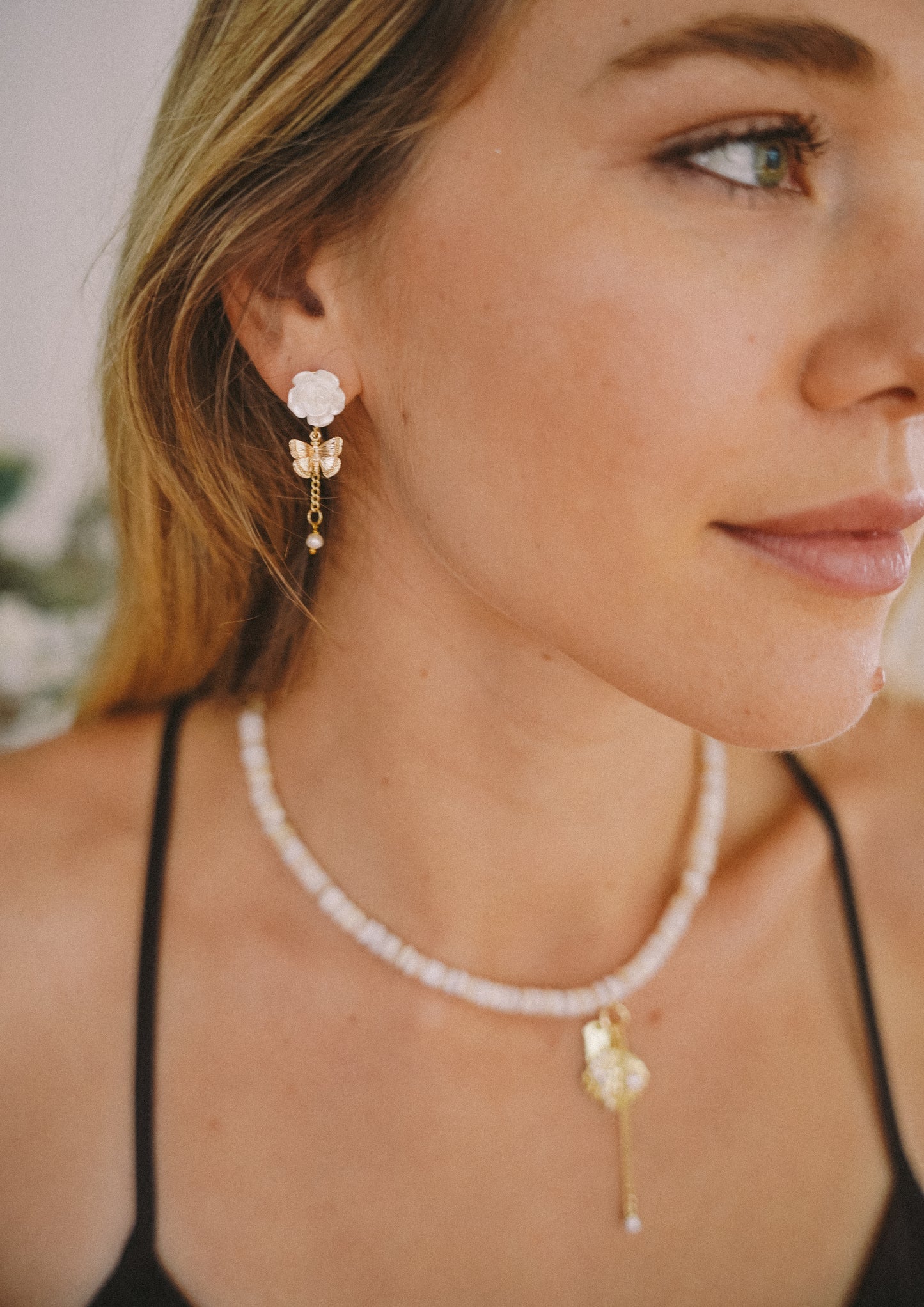 Winged flower earrings