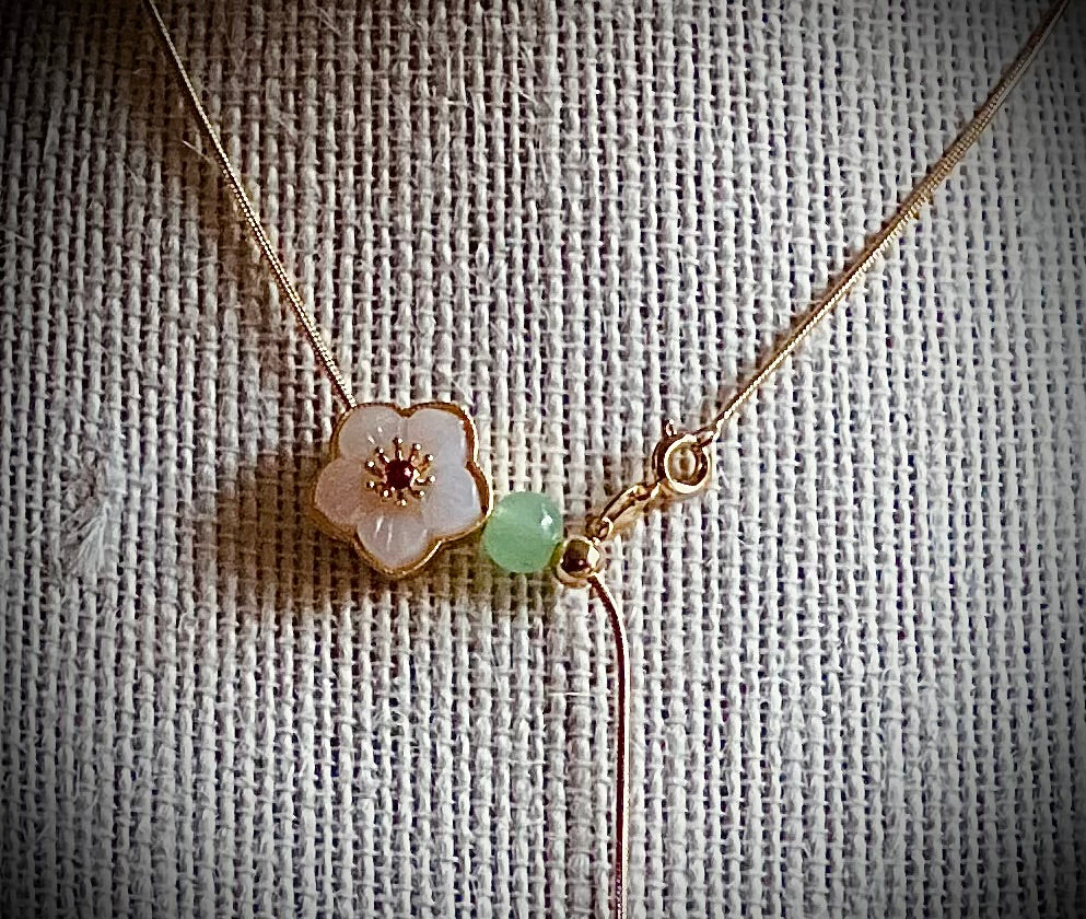 Adjustable ivory coloured flower