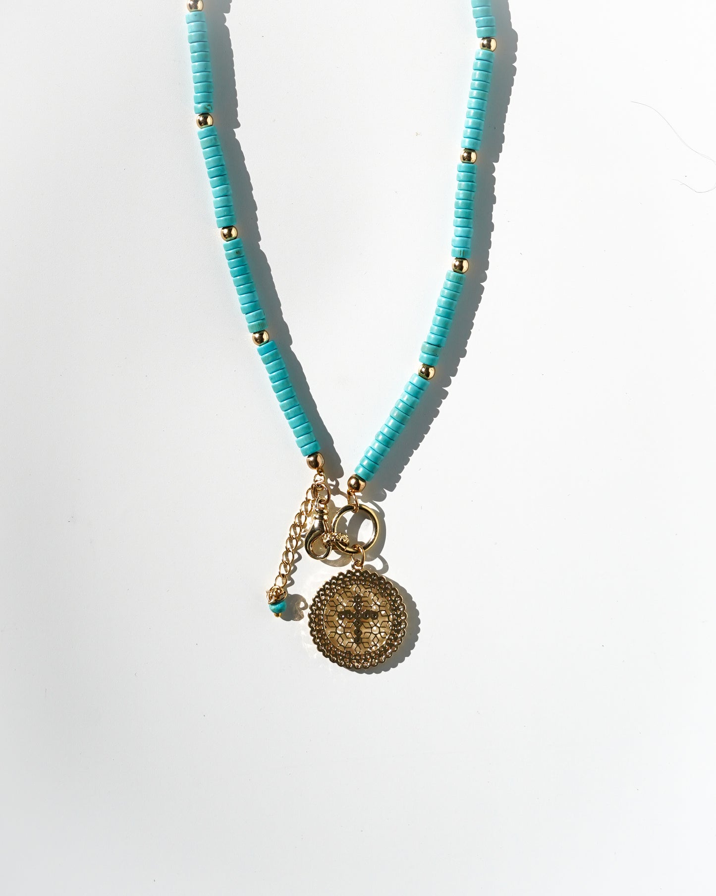 Turquoise cross necklace