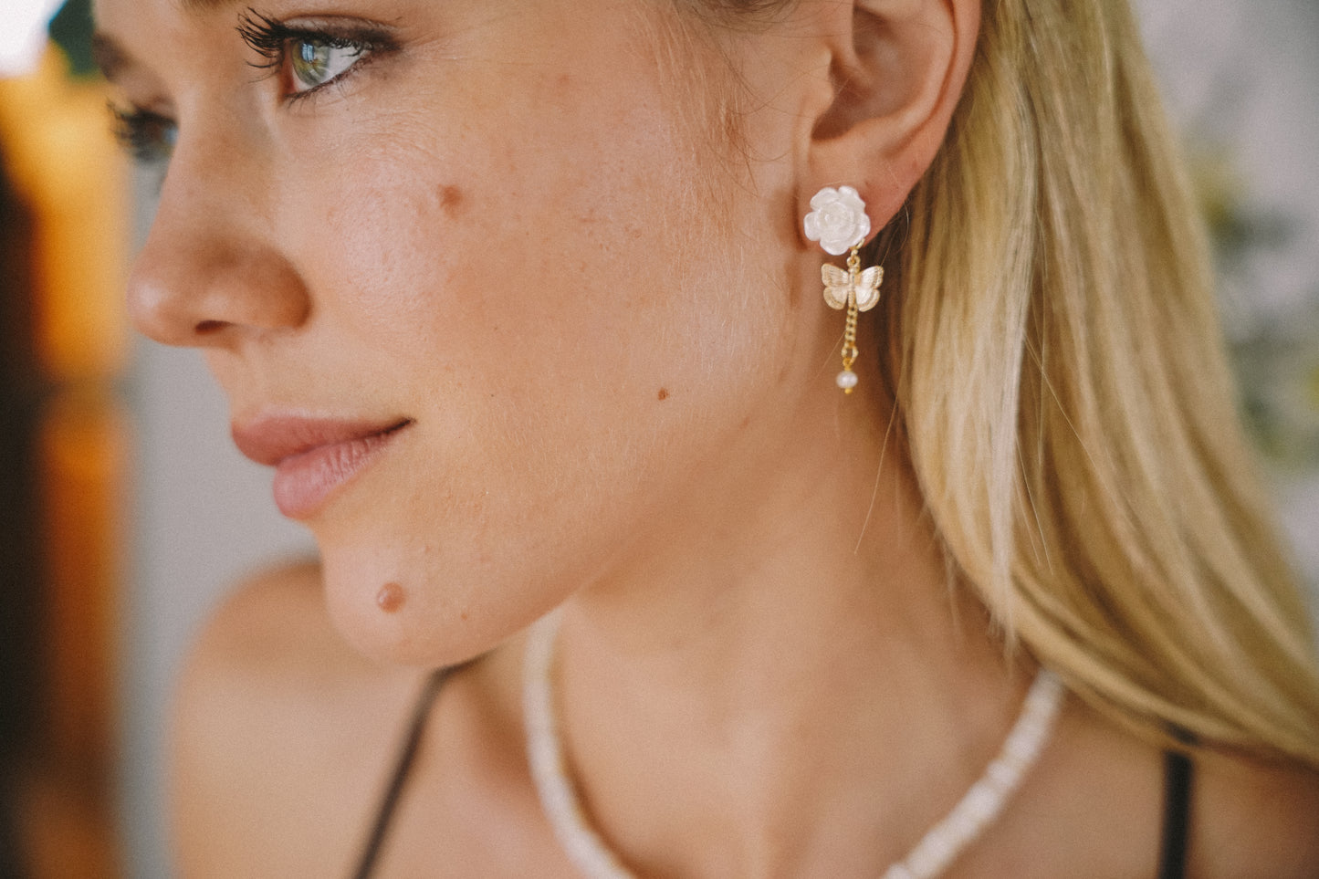 Winged flower earrings