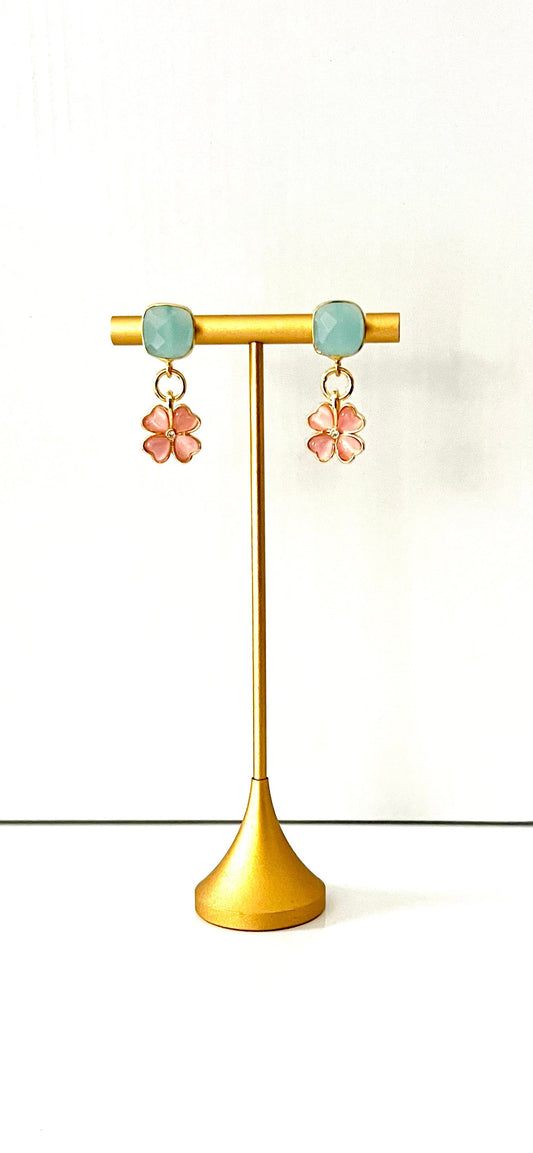 Pink resin flower earrings anchored by polished green chalcedony, with a 2cm drop