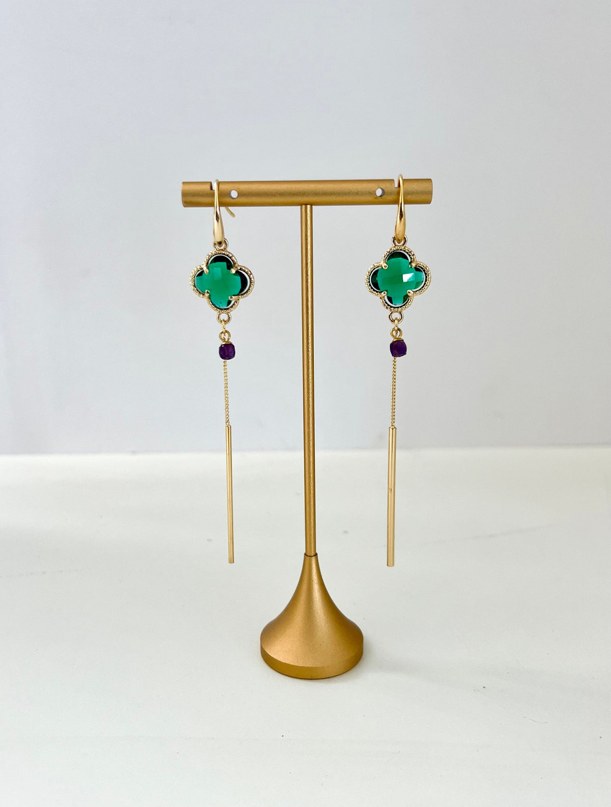 Turquoise clover drop earrings with an amethyst bead and elongated gold-plated bar