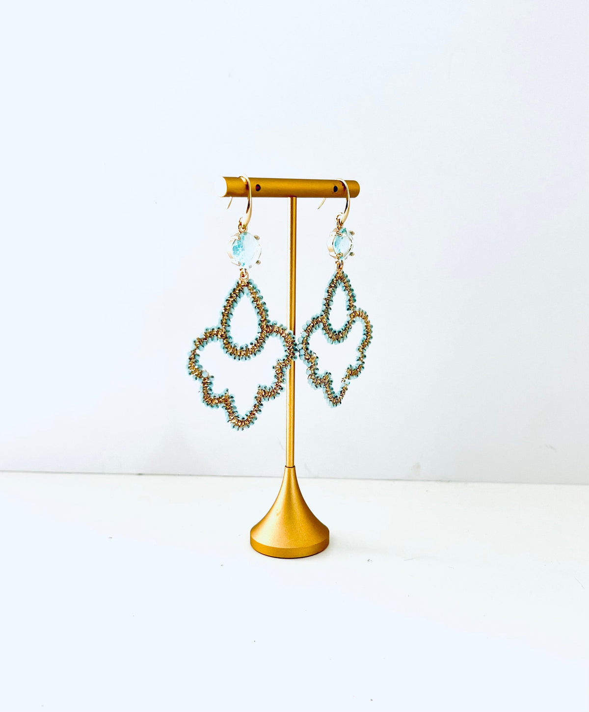 Pale blue beaded drop earrings with a sparkling pale blue cubic zirconia post – view 2