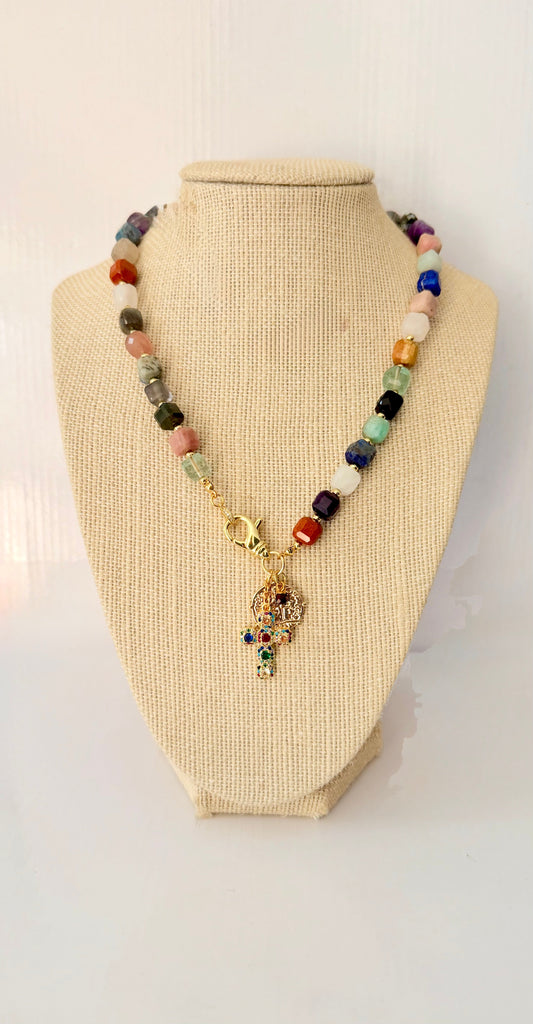 Multi-coloured quartz beaded necklace with gold plated spacers and coloured cross centrepiece