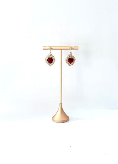 Red resin heart earrings with an 18K gold frame and loop flower post