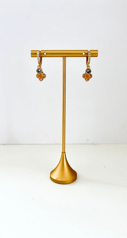 Double huggie earrings with cubic zirconia sparkle and warm amber clover charms – view 2