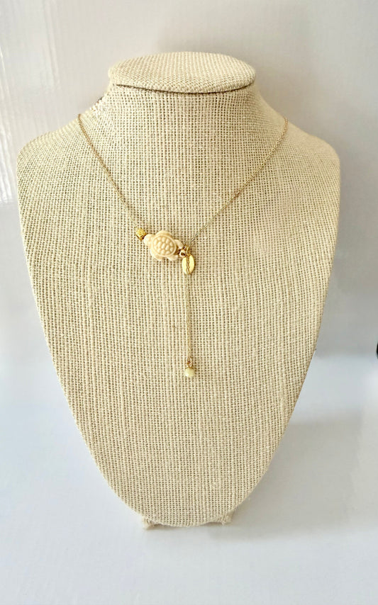 Gold-filled adjustable necklace with a natural ceramic turtle charm