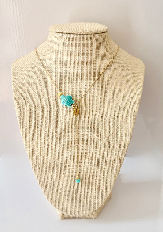 Gold-filled adjustable necklace with a teal ceramic turtle charm